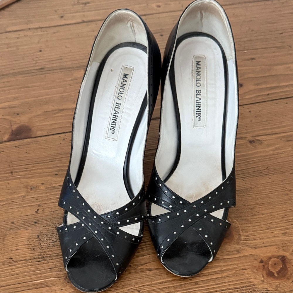 Manolo Blahnik Black Heels with white accents.
